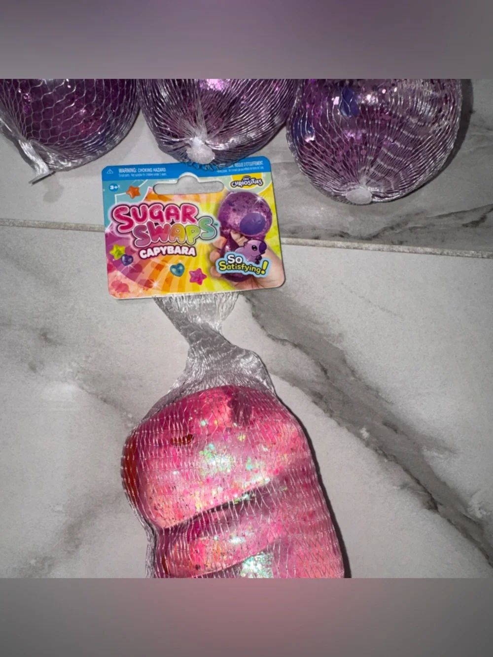 Sugar swaps Glitter Squishes capybaras  - Blue, Purple & Pink Sensory Toy